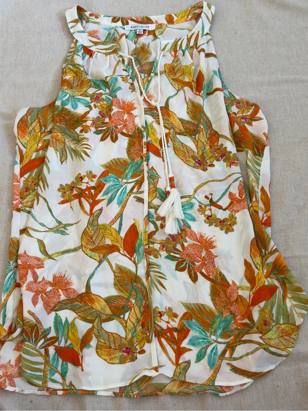 Rose & Olive Cream Floral Sleeveless Tassel Tie Top with Orange and Teal Accents